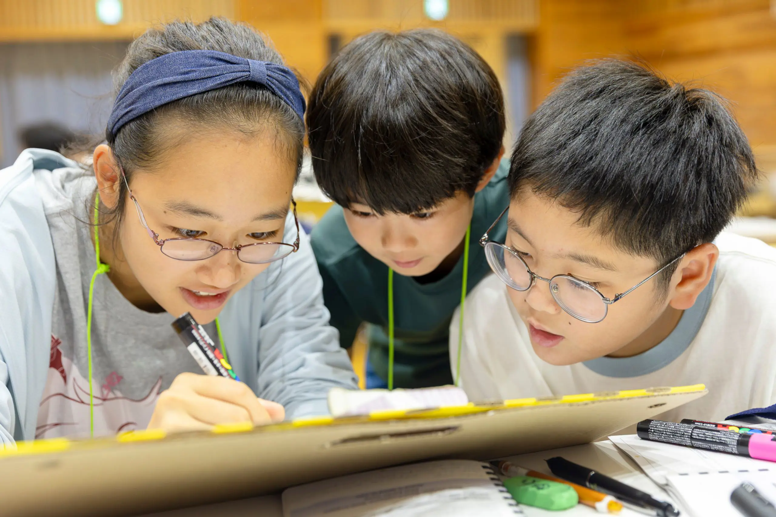 Three students working on a project